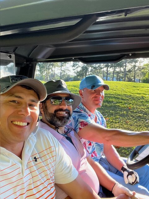 Three veterans riding together between holes