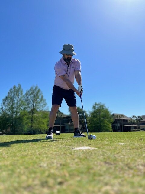 A veteran teeing off