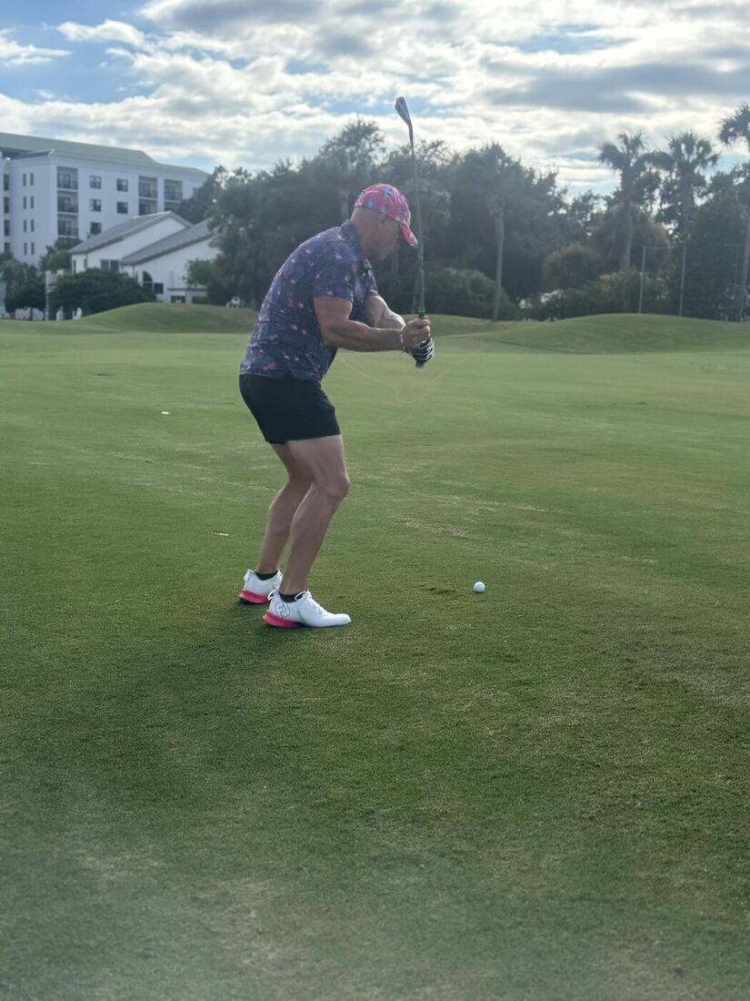 A veteran's follow-through on the fairway