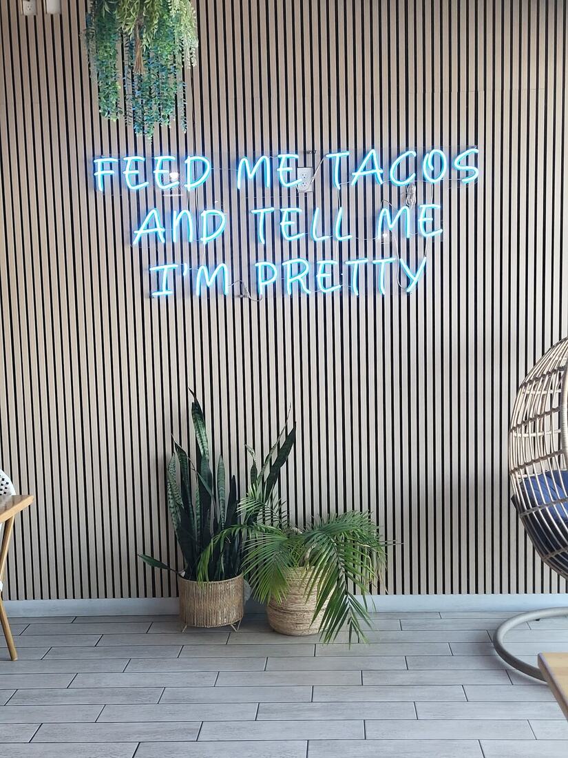 A neon sign at a local restaurant where the group gathered