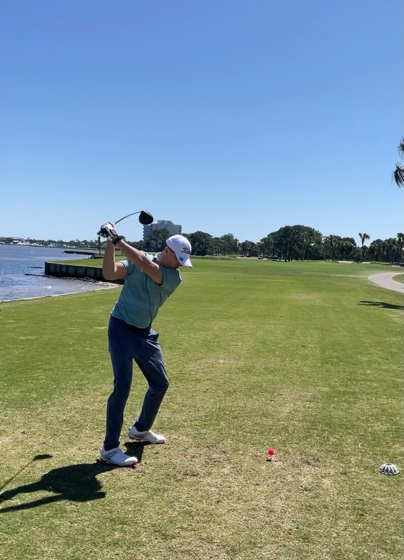 Ryan Moffett golfing